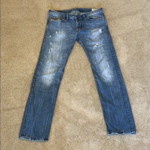 Mid-wash Distressed Diesel jeans
